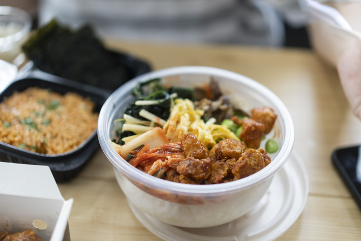 Top view takeaway Bibimbap and fried chicken Korean style Korean food and cuisine Delivery food service at home