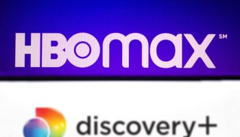 In this photo illustration the Discovery+ (Plus) logo seen...