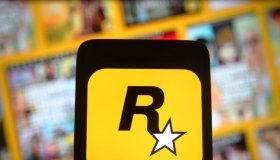 In this photo illustration, a Rockstar Games Inc logo of a...