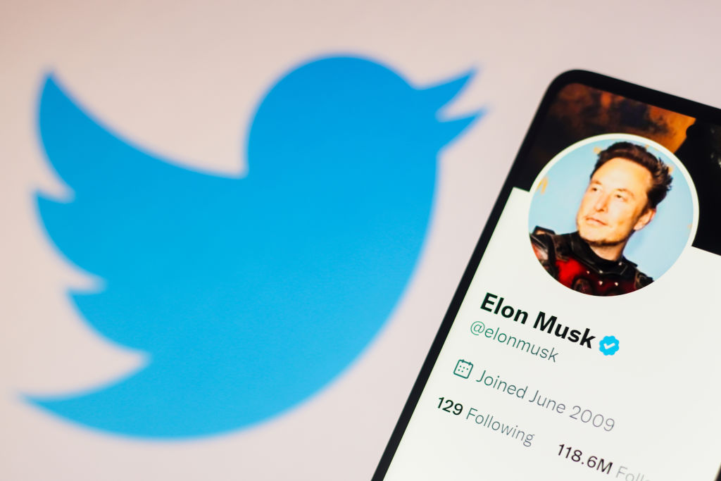 In this photo illustration, the Elon Musk Twitter account...