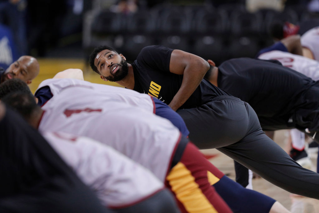 Tristan Thompson (13) stretches with teammates during an off day practice and media day at Oracle Arena before the Golden State Warriors play the Cleveland Cavaliers in Game 1 of the NBA Finals in Oakland, Calif, on Wednesday, May 30, 2018