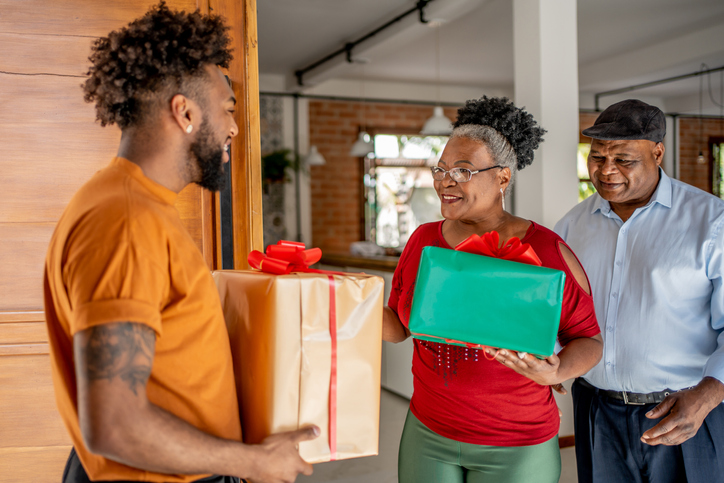 Grandson Arriving for Christmas with Grandpa and Grandma