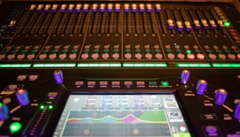 Sound recording studio mixer desk: professional music production.