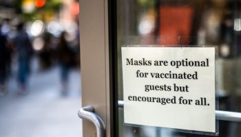 Information sign on a restaurant door during COVID-19 in New York
