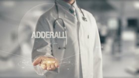 Doctor holding in hand Adderall