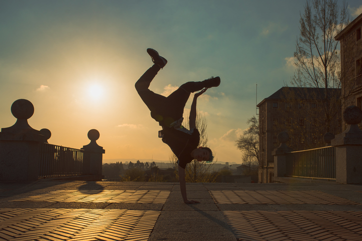 teenager dancing in the street