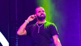 Drake Chicago performing on stage hit phone