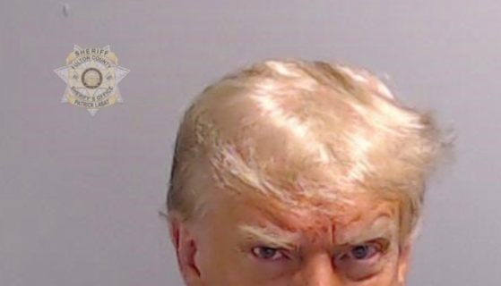 Ex-White House Aide Says Trump Refused To Wear COVID Face Mask Because
He Got “Bronzer” On It