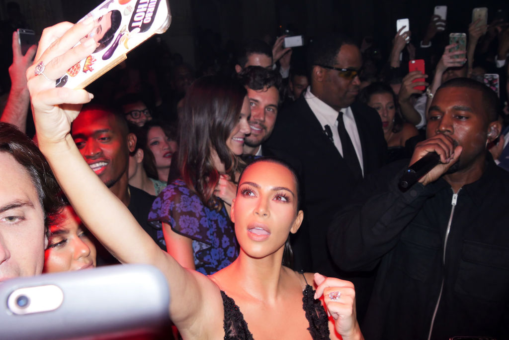 Kim Kardashian & Bianca Censori Hug At Kanye West Event