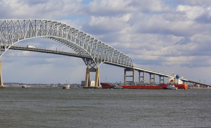 Tugs assisting tanker near Baltimore's Key Bridge