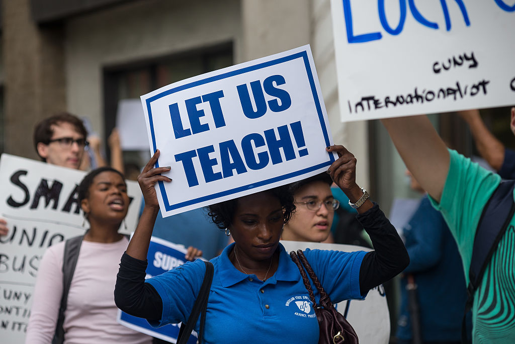 Nearly a hundred faculty members, students, clerical staff...