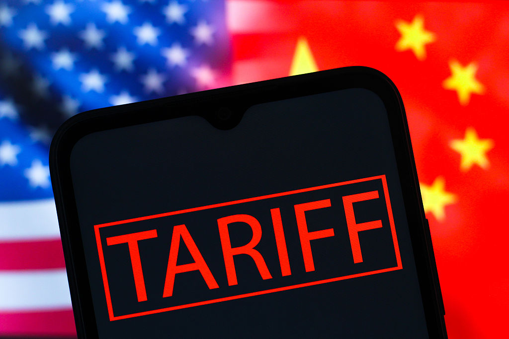In this photo illustration, the Tariff text is seen...