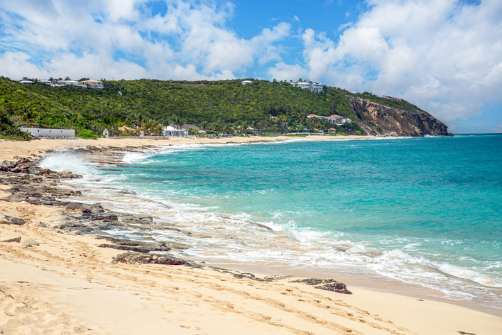 Secluded sandy beach with turquoise water