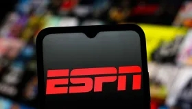In this photo illustration, the ESPN (Entertainment and...