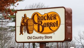 A sign is seen outside of a Cracker Barrel Old Country Store...