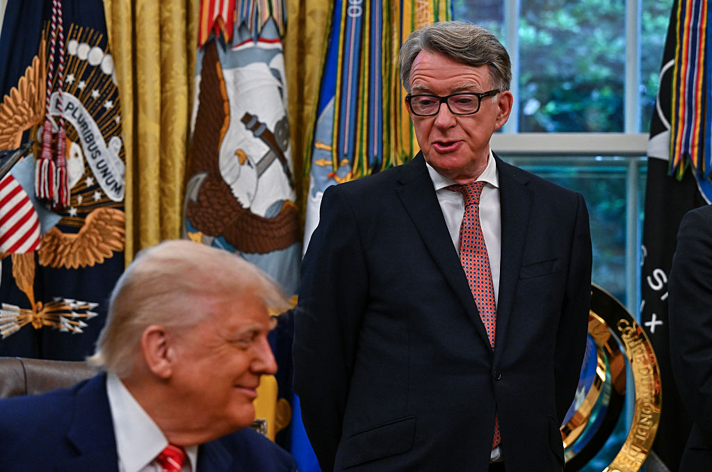 WASHINGTON, DC - MAY 8: President Donald Trump, listens as Brit