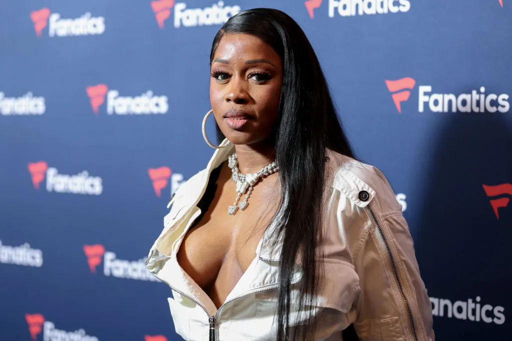 Remy Ma Rocks A Tiny Red Bikini & Fur Coat In The Snow