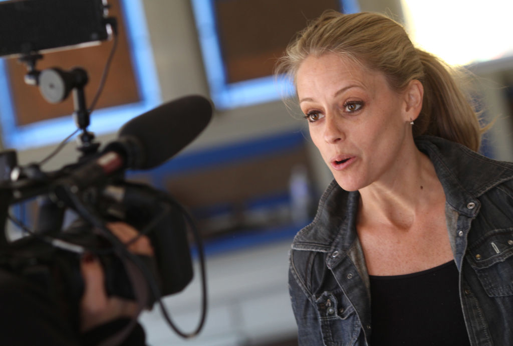 BRUCE BISPING ¬• bbisping@startribune.com Minneapolis, MN., Friday, 10/15/10] (left to right) Production crew photographer Christina Hilbig taped Nicole Curtis, host of "Rehab Addict with Nicole Curtis" as they filmed a segment on the restoration of o