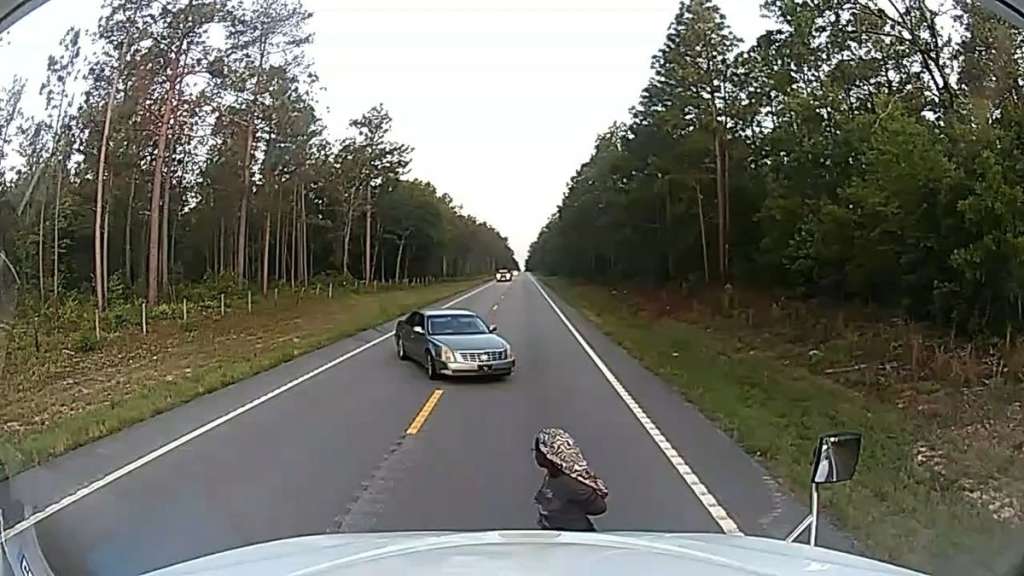 Anthony J. Moore Rescues Black Woman While Driving Truck