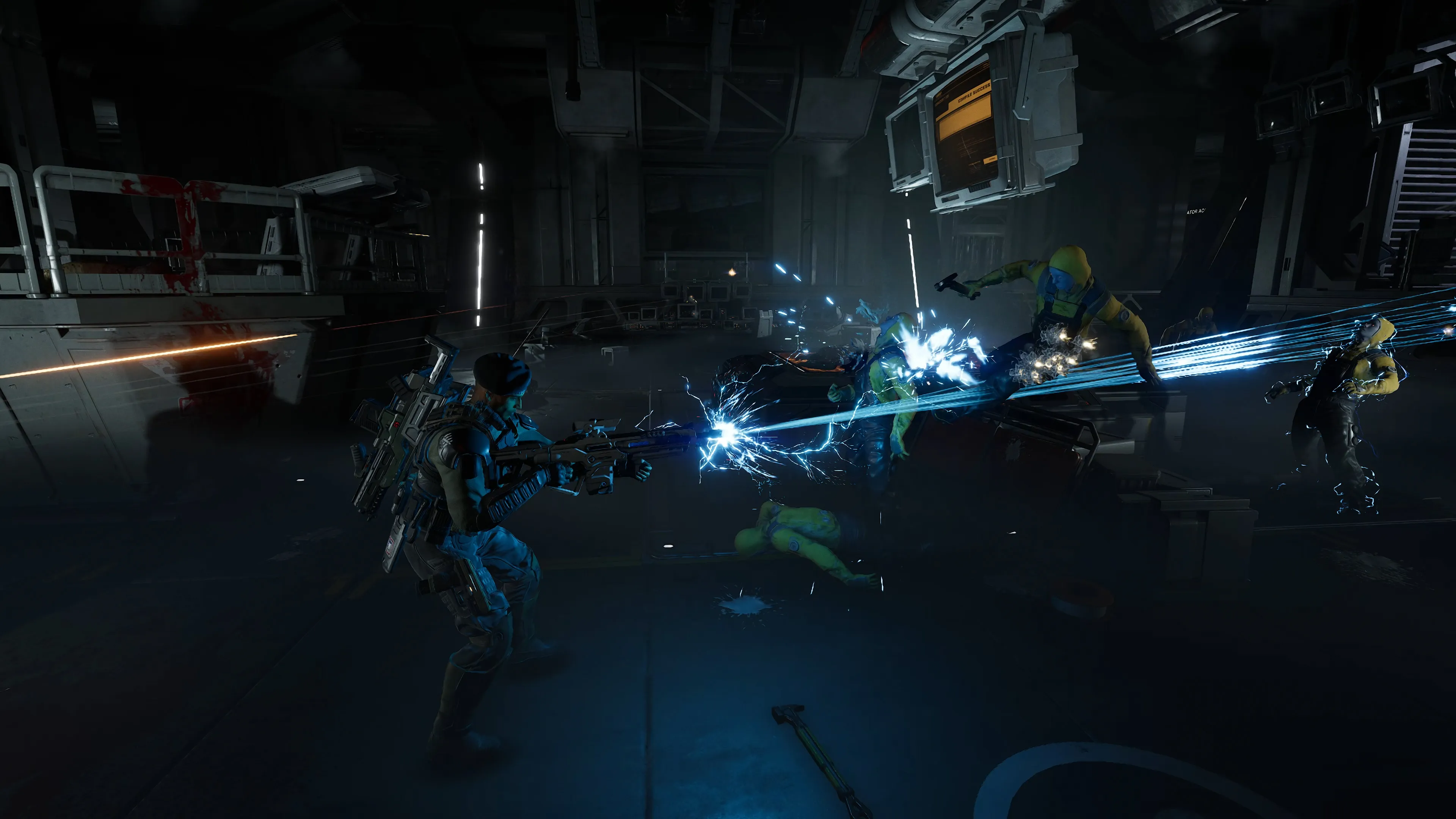 A dark industrial setting with workers in protective gear welding and using power tools, creating sparks and bright flashes of light.