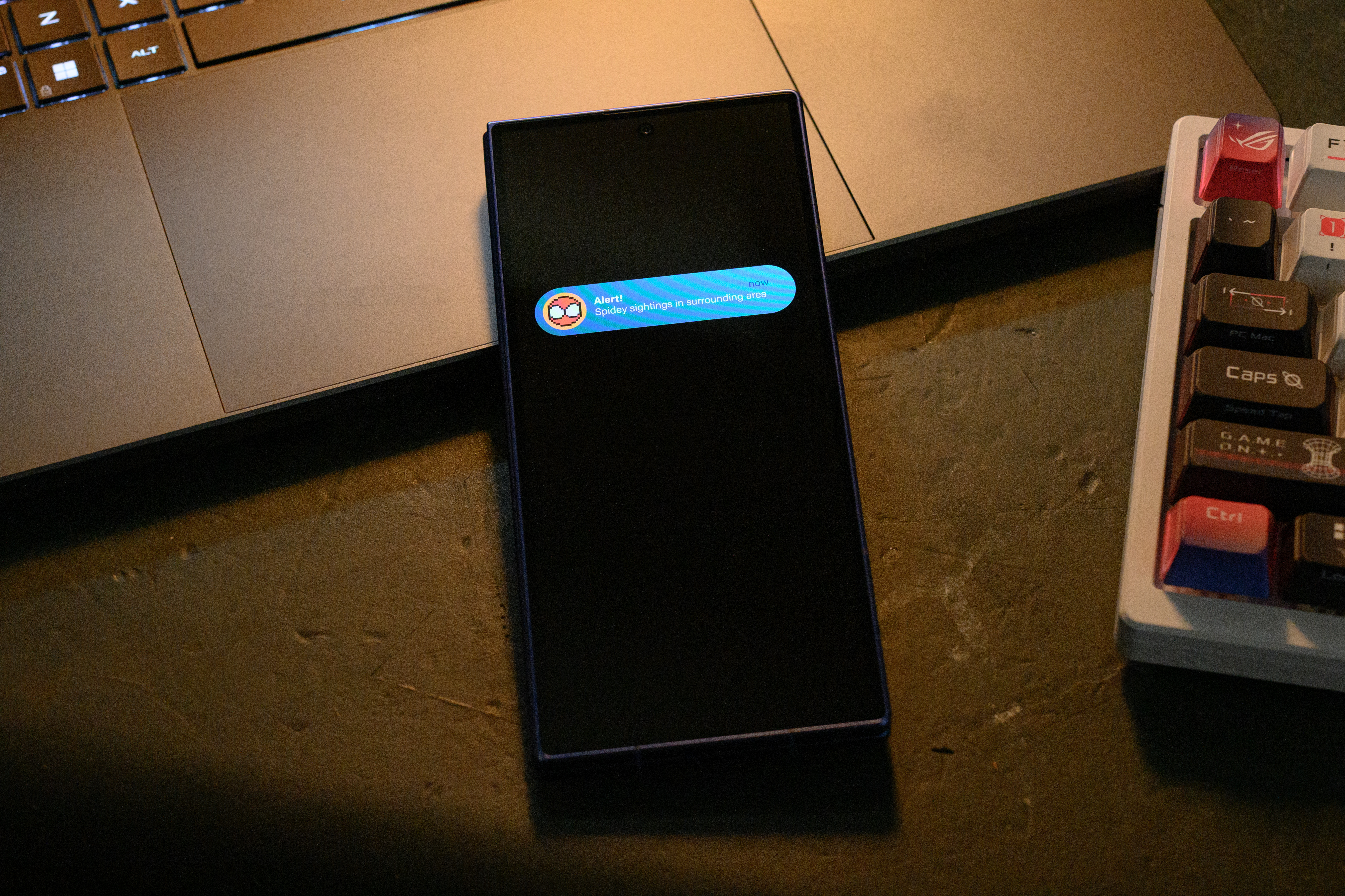 A black smartphone displaying an alert message about safety regulations in a restricted area.