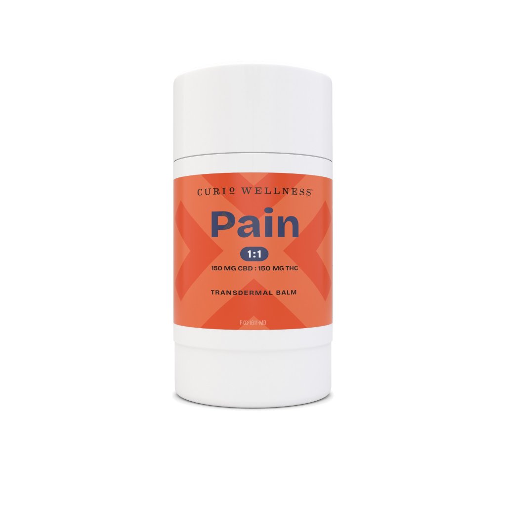 A white container with an orange label that says "Curio Wellness Pain 1:1 150 MG CBD : 150 MG THC Transdermal Balm".