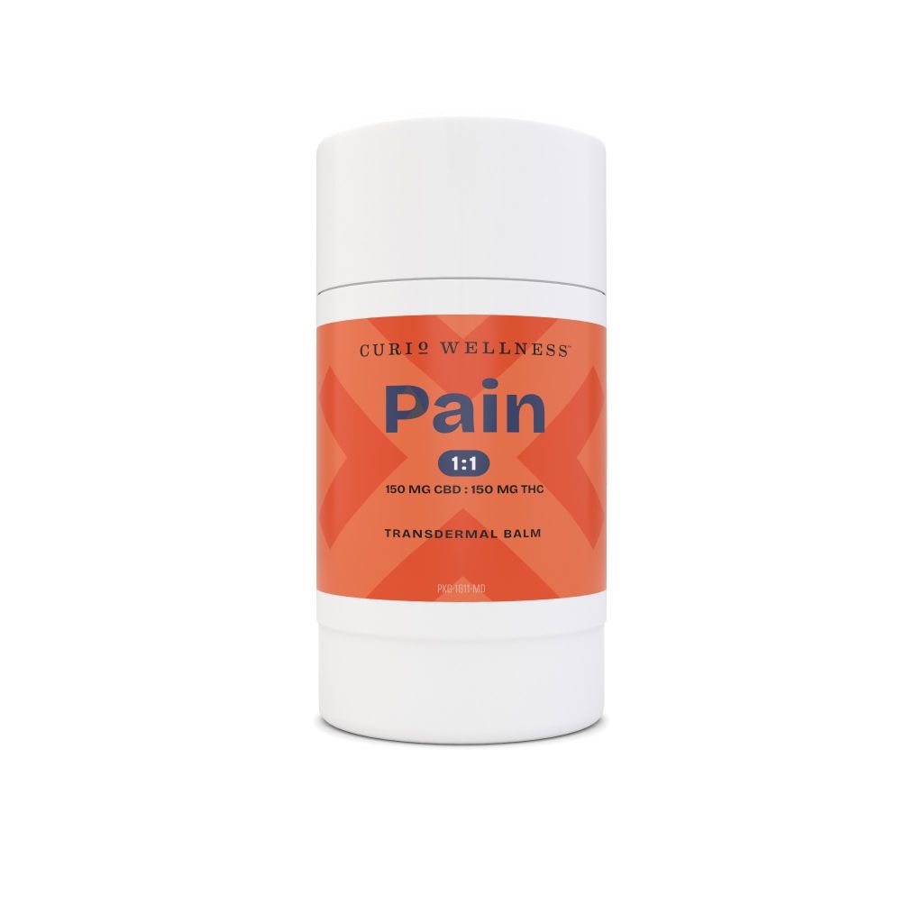 A white container with an orange label that says "Curio Wellness Pain 1:1 150 MG CBD : 150 MG THC Transdermal Balm".
