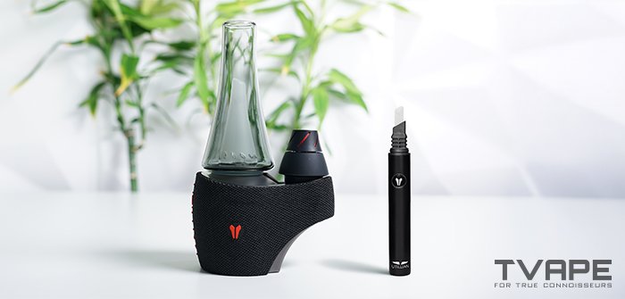 A black vape device with a glass tank and a black vape cartridge.