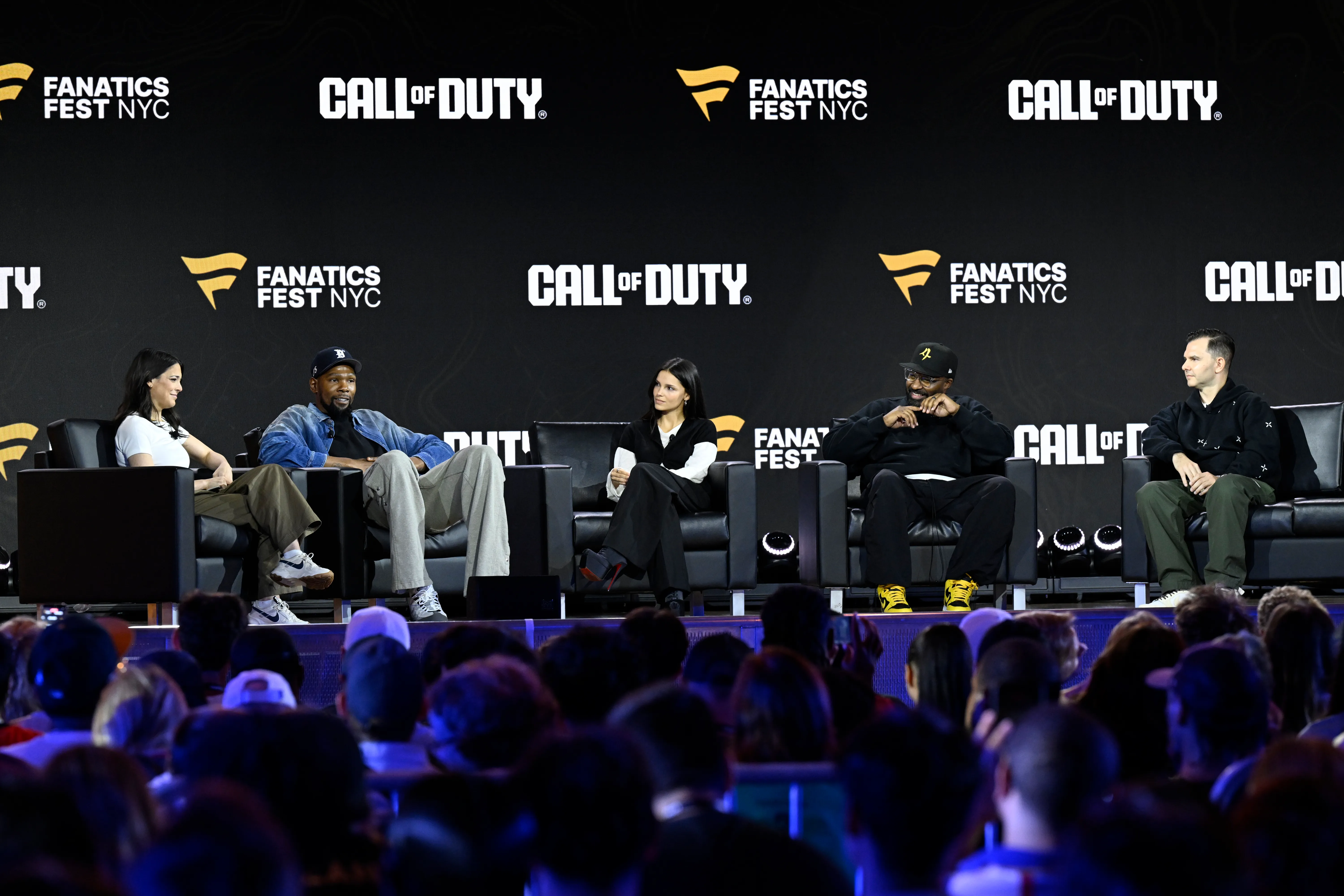 A panel discussion on stage at Fanatics Fest NYC 2026, featuring speakers discussing the Call of Duty video game franchise. The Fanatics Fest NYC and Call of Duty logos are visible.