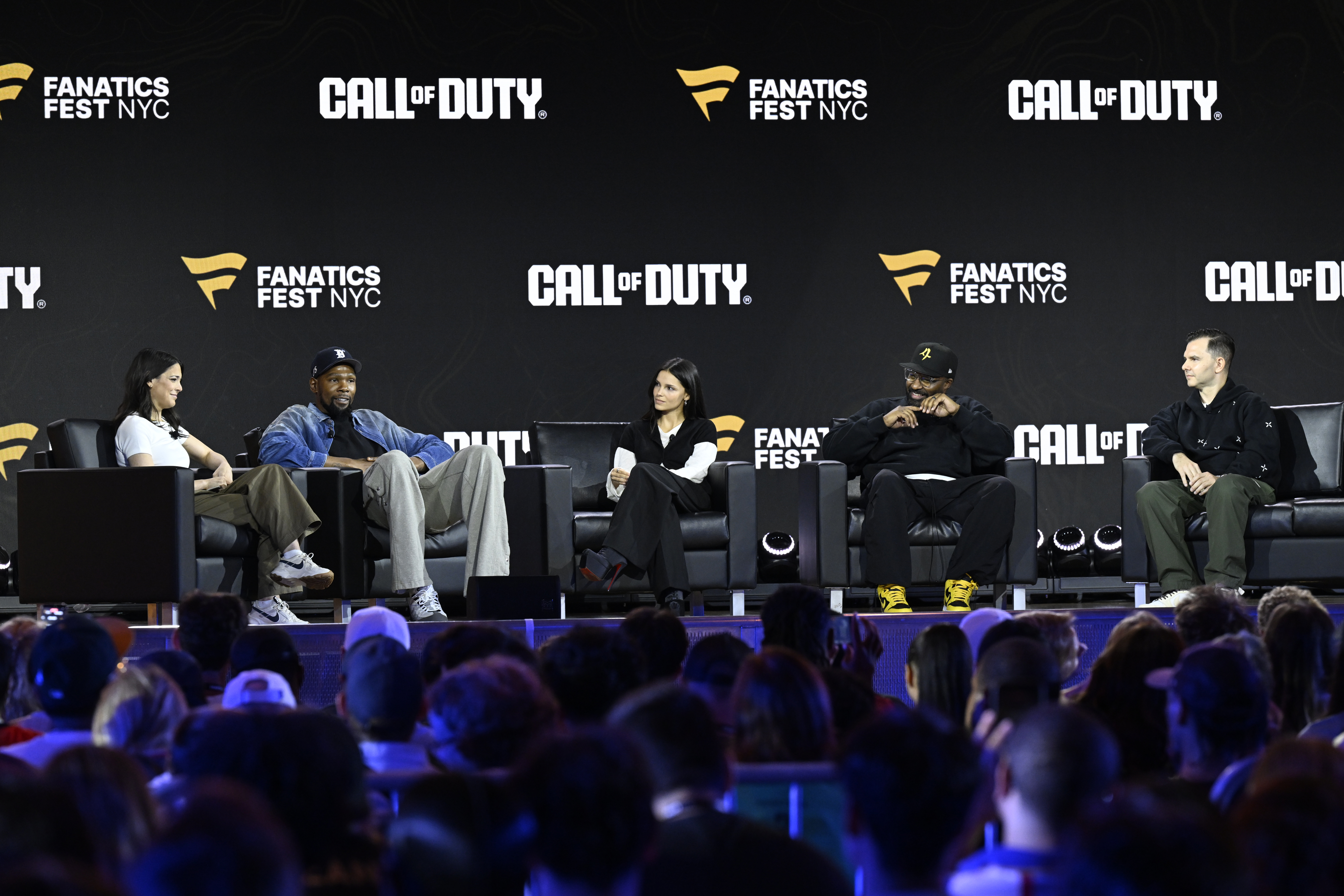 A panel discussion on stage at Fanatics Fest NYC 2026, featuring speakers discussing the Call of Duty video game franchise. The Fanatics Fest NYC and Call of Duty logos are visible.