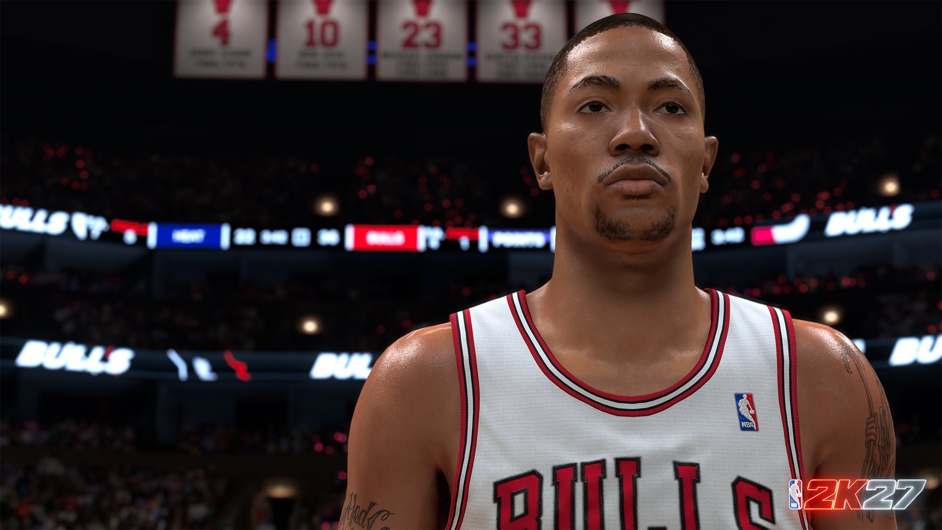 A basketball player wearing a Chicago Bulls jersey stands on a basketball court with scoreboard displays in the background.