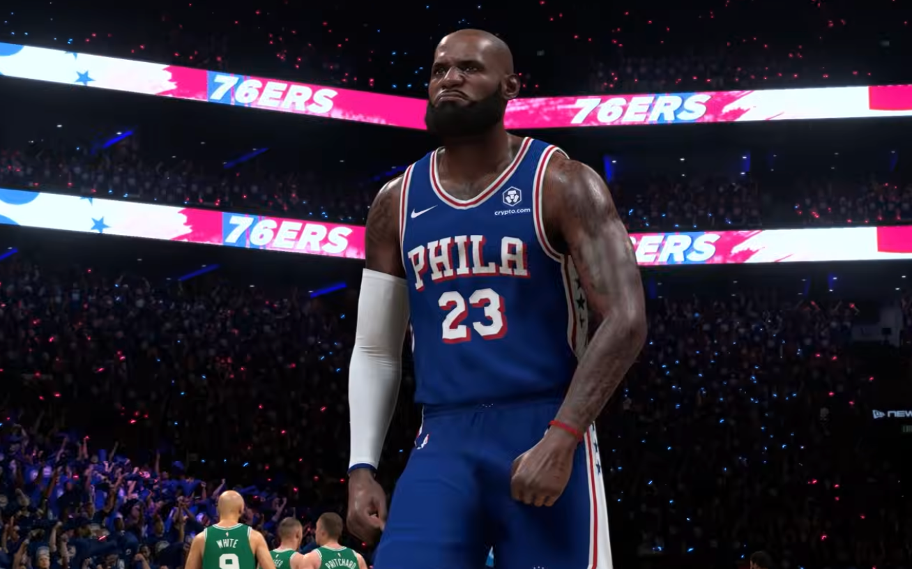 A basketball player wearing a Philadelphia 76ers jersey with the number 23 stands on a basketball court with the 76ers logo visible.