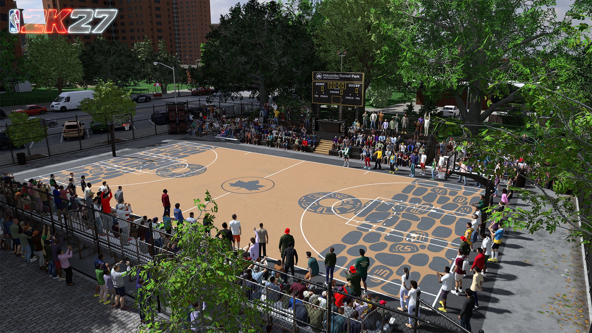 Outdoor basketball court with crowds of people, surrounded by trees and buildings. Large "NBA K27" logo visible on the court.